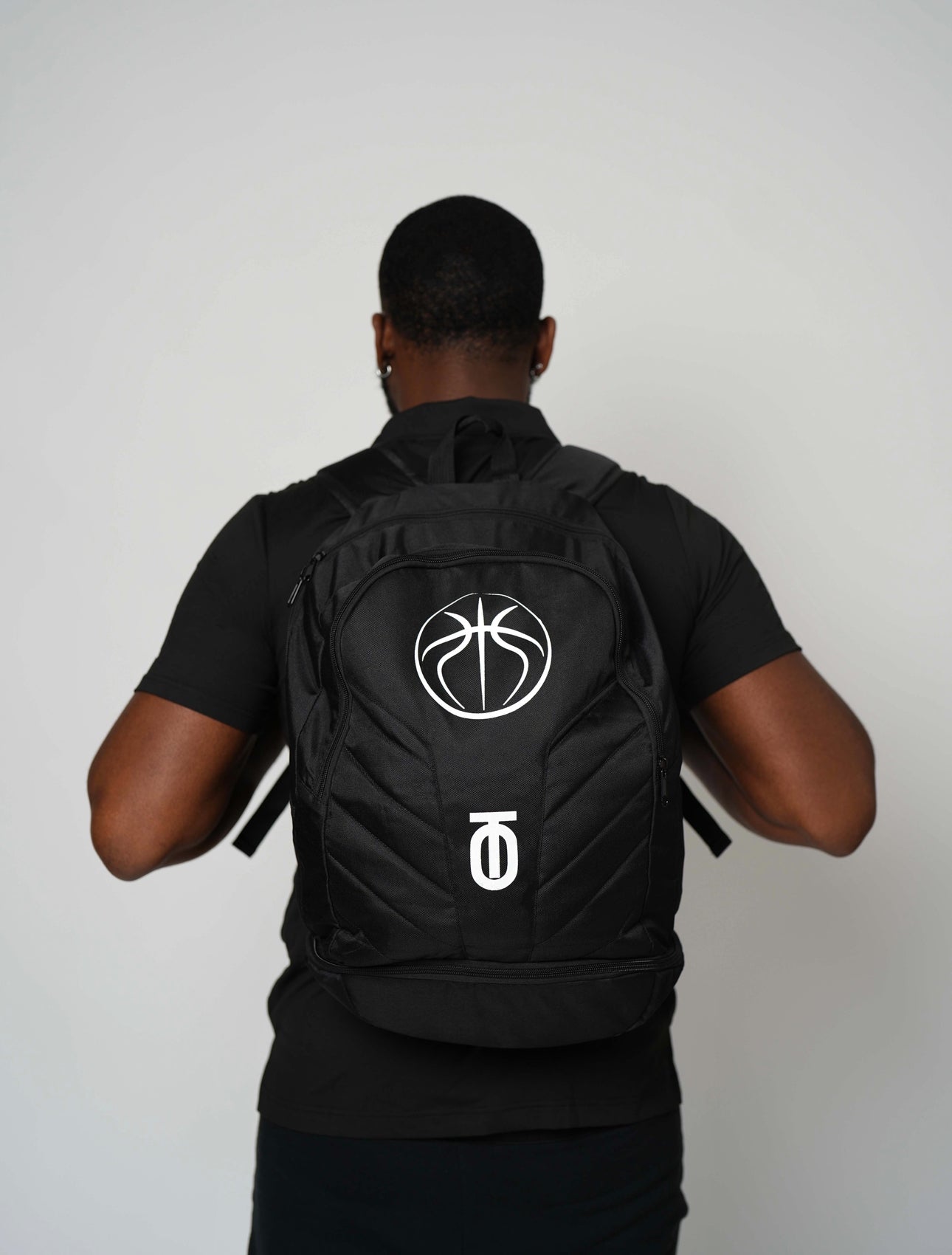 Element backpack featuring durable materials, multiple compartments, padded straps, and sleek design perfect for athletes and students on the go