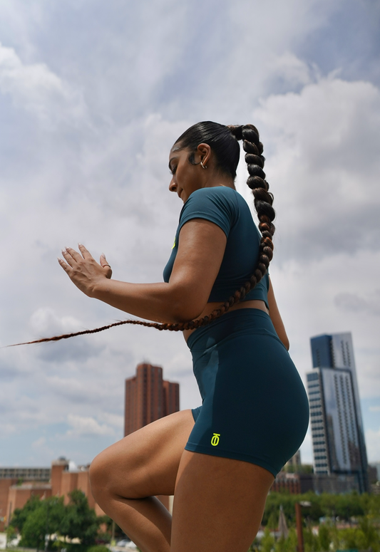 Take One Unity Top with moisture-wicking fabric, lightweight breathable design, and athletic fit ideal for training and everyday wear