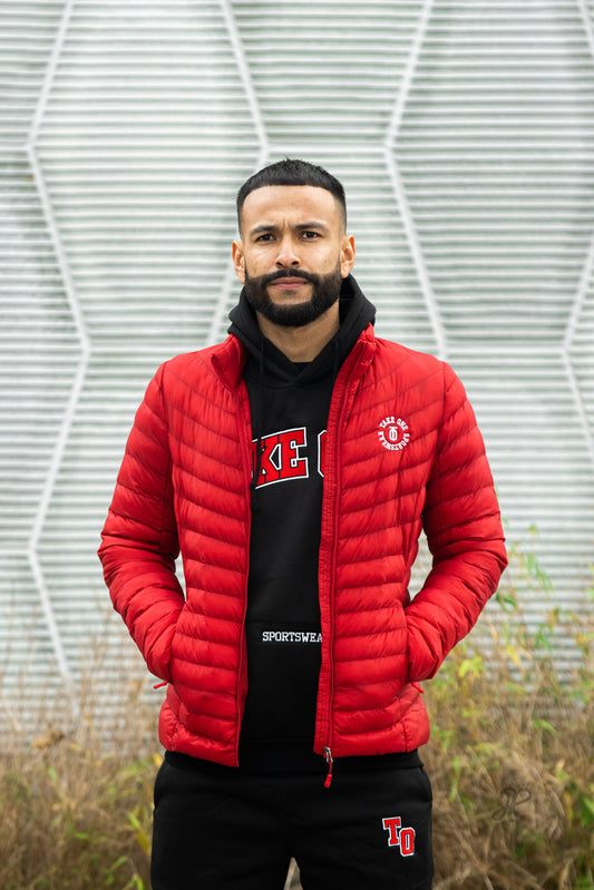 Take One Rush-Fit Puffer Jacket with lightweight insulation, water-resistant shell, and zippered pockets for warmth and protection in cold weather