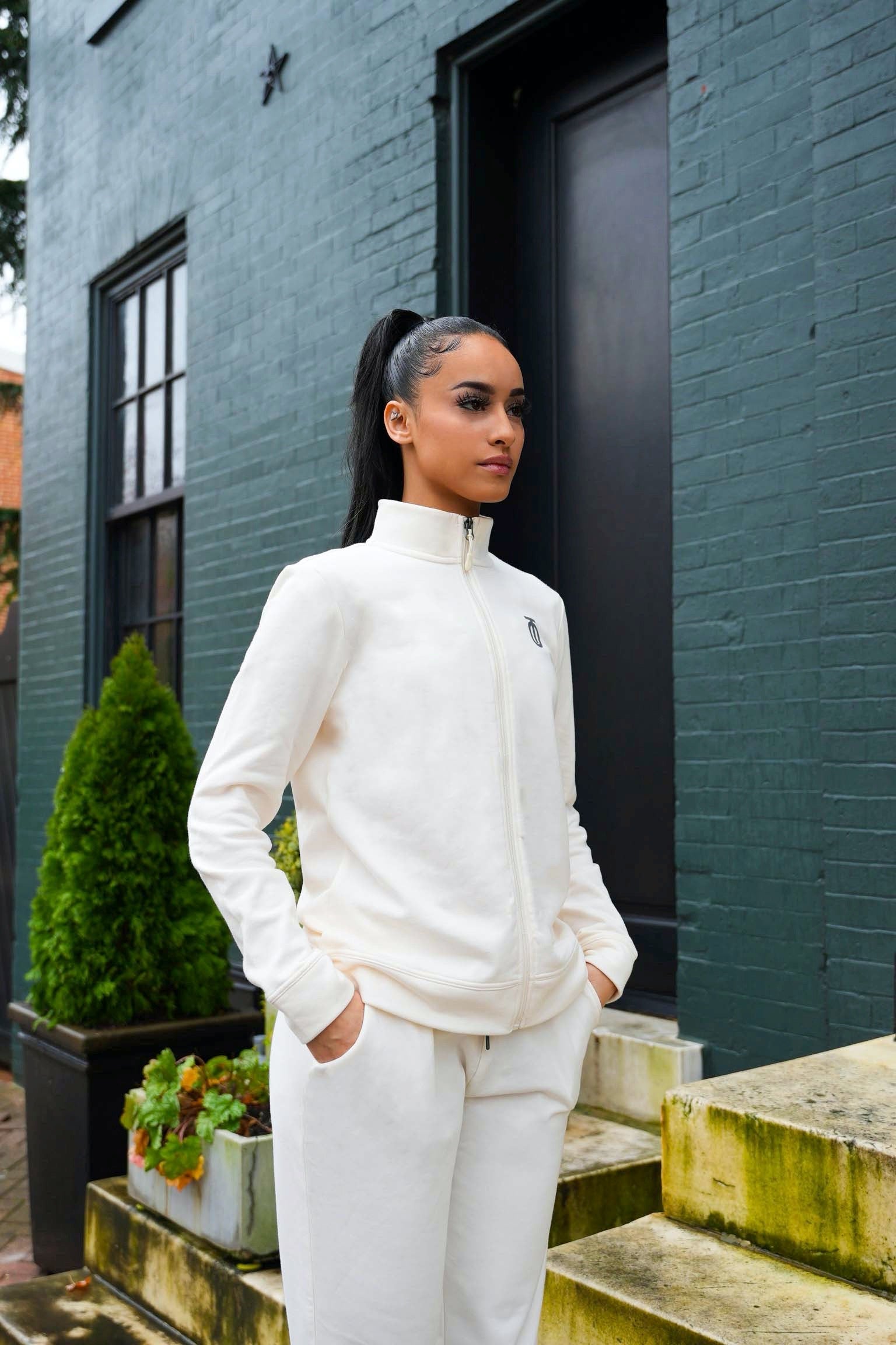 Take One Essence Track Jacket with lightweight, breathable fabric, full zip front, and sleek design for comfortable athletic and casual wear