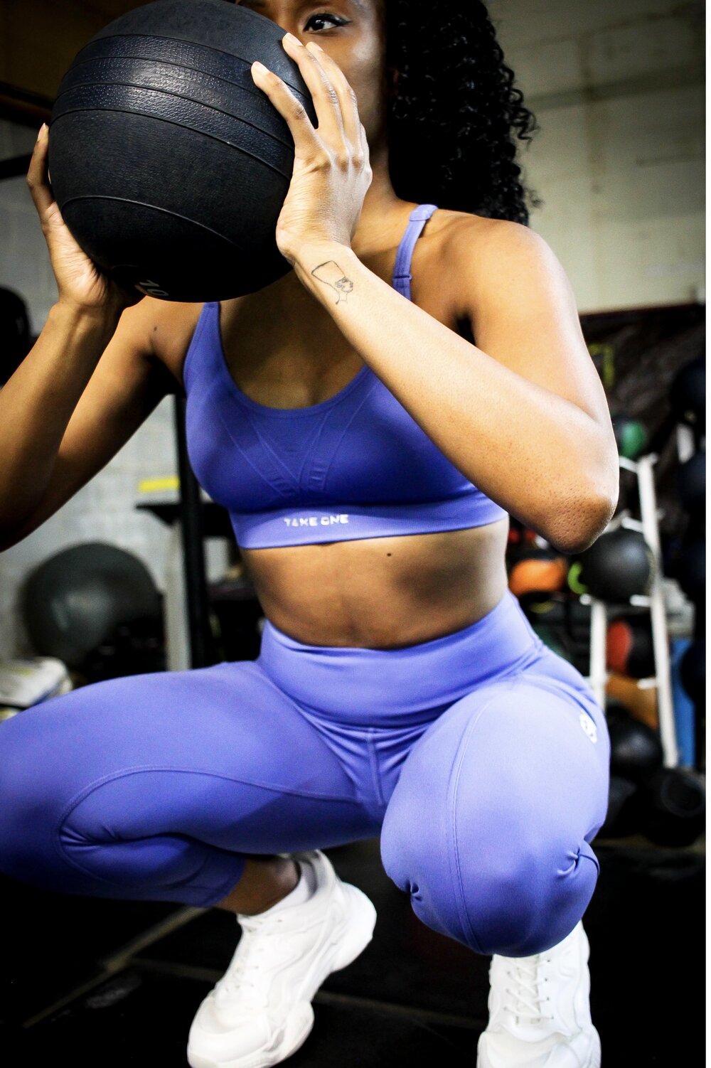 Take One Beauty is Pain Compression Bra offering medium support, moisture-control fabric, and racerback design for active performance