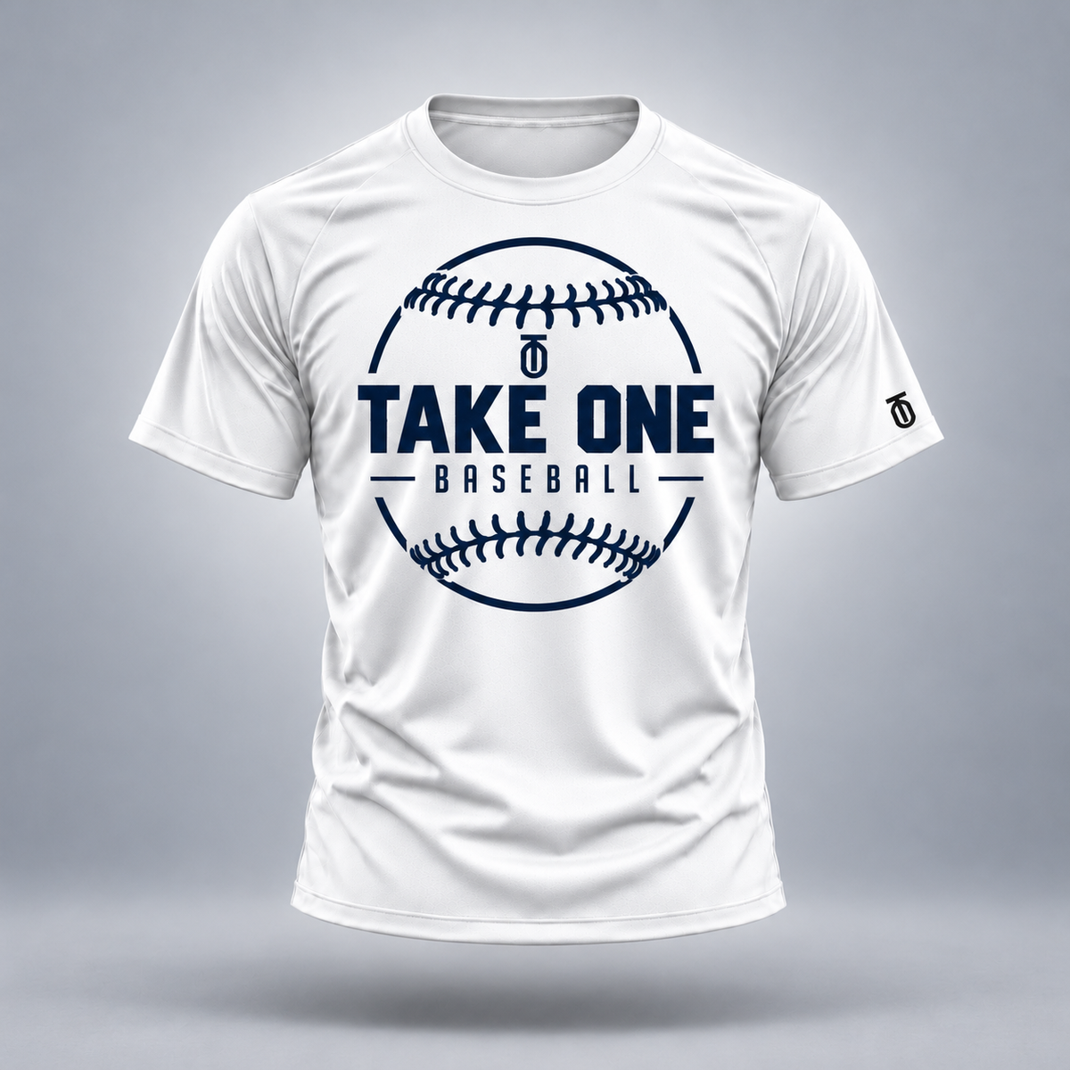 Take One Baseball Signature Performance Graphic Tee by Take One Sportswear in White, front view featuring clean baseball-seam emblem and TO sleeve branding.