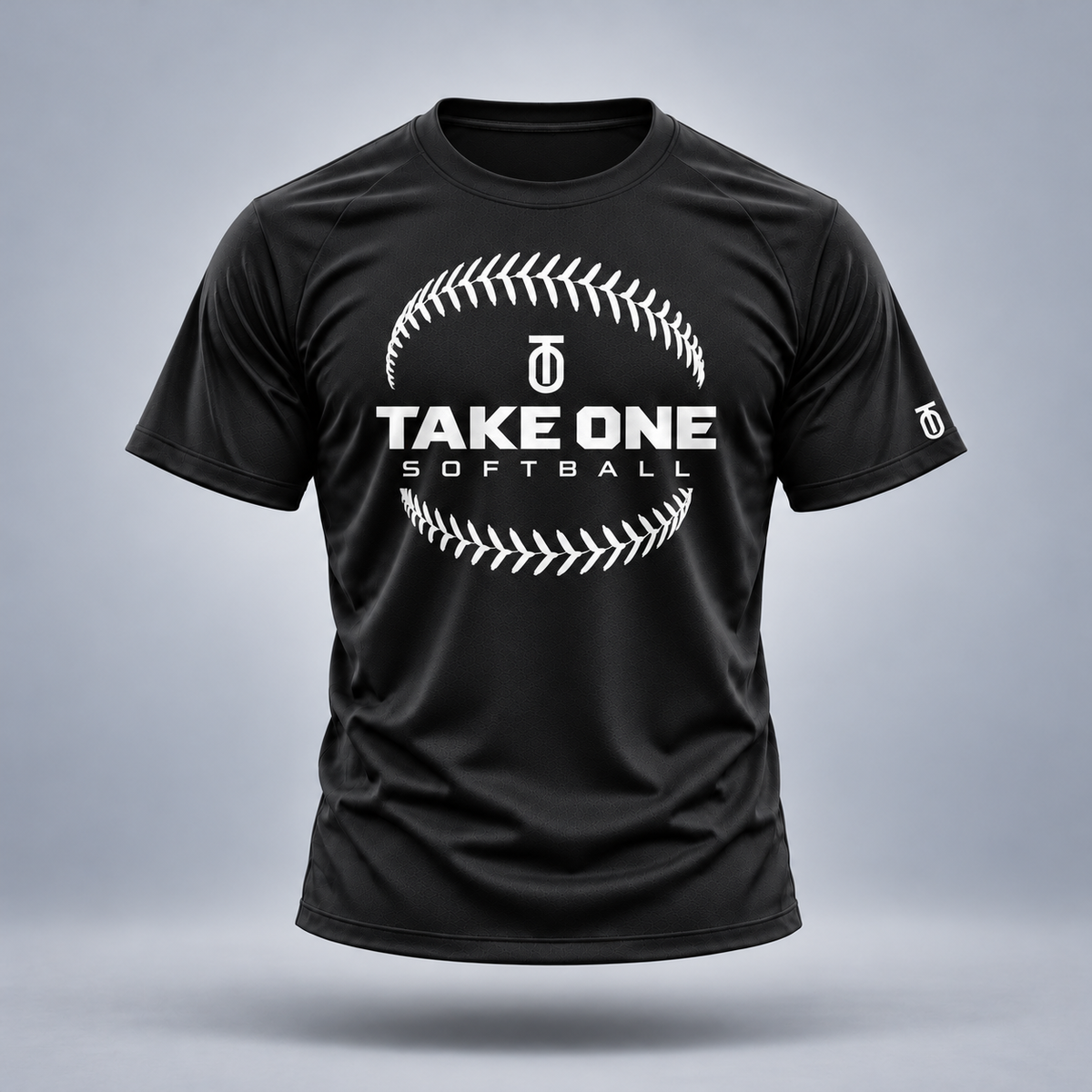 Take One Softball Signature Performance Graphic Tee by Take One Sportswear in Black, front view featuring clean softball-seam emblem and TO sleeve branding.