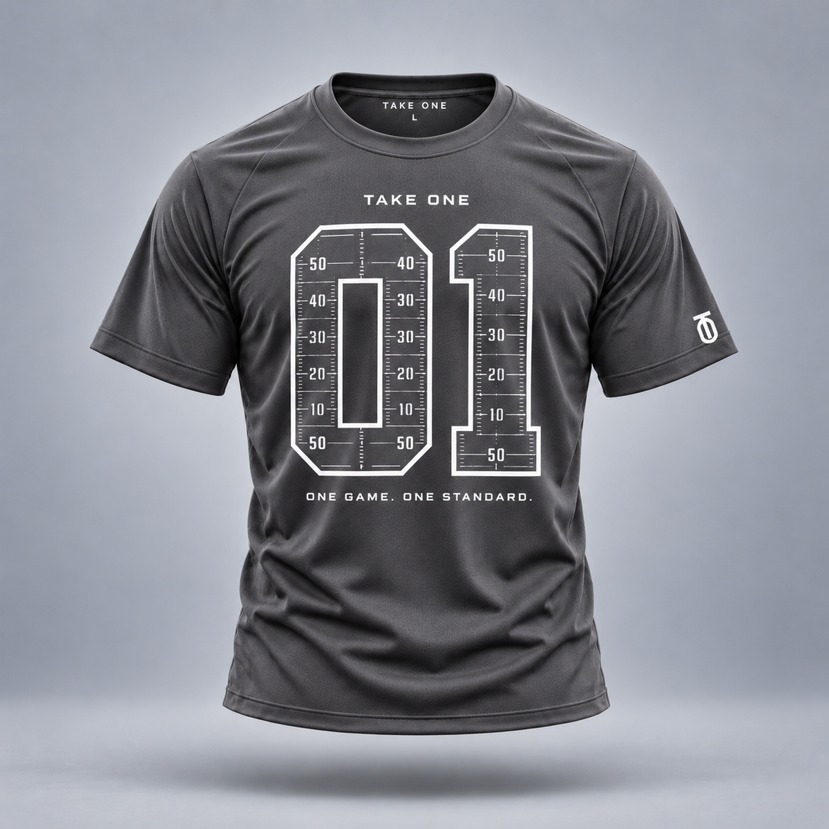 Take One One Game Graphic Tee by Take One Sportswear in charcoal grey, front view with original football artwork.