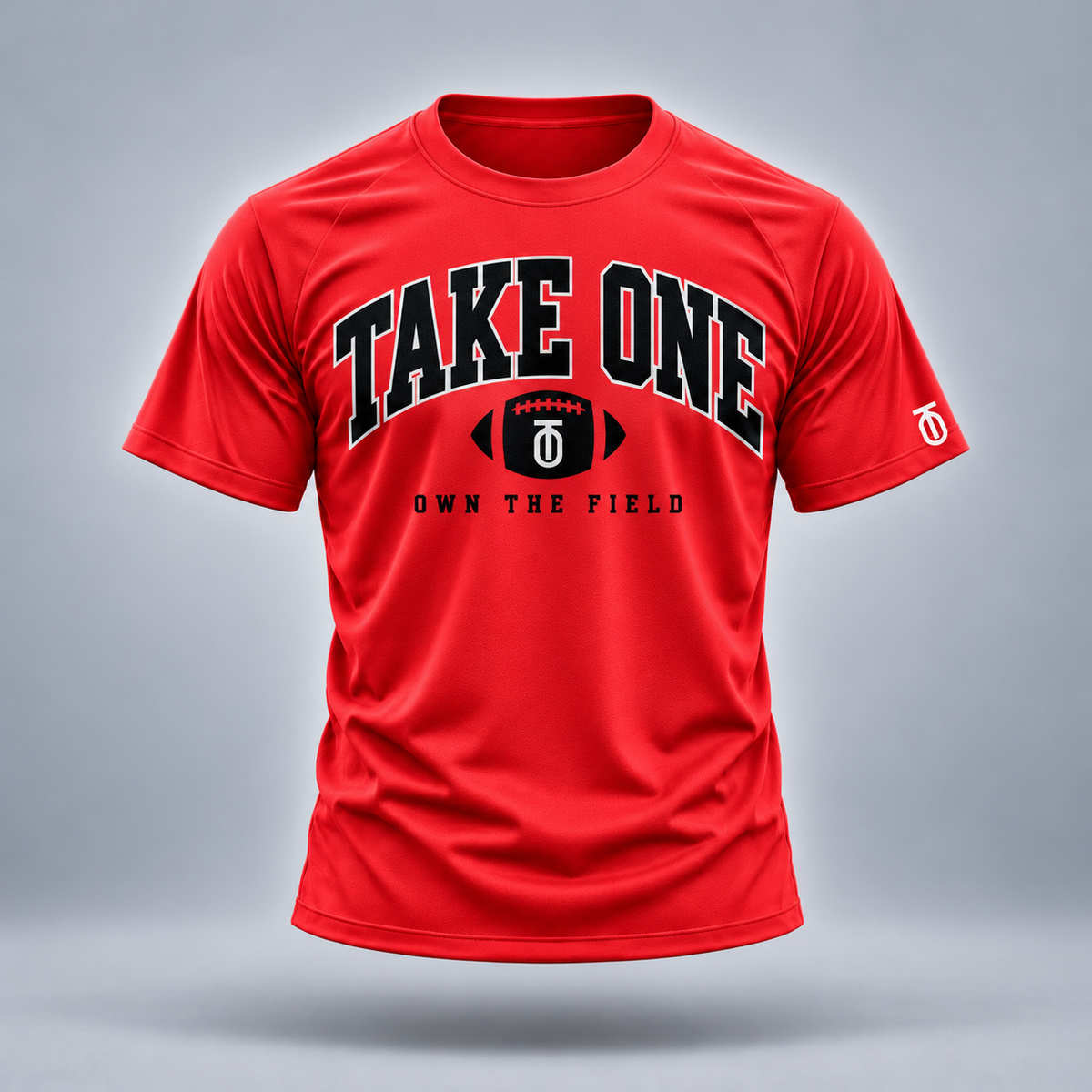 Take One Own The Field Graphic Tee by Take One Sportswear in red, front view with original football artwork.