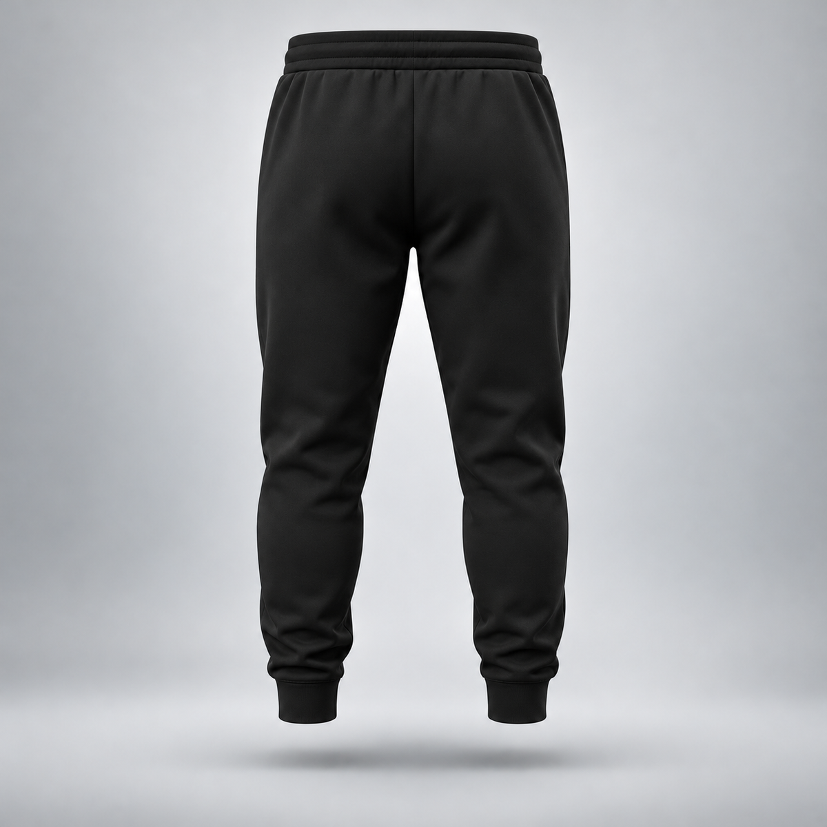 Take One Sportswear black Football Performance Joggers back view featuring a clean, unbranded design, tapered legs, and ribbed ankle cuffs.