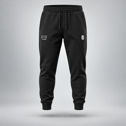 Take One Sportswear black Football Performance Joggers front view featuring white TO monogram, United By The Game graphic, relaxed athletic fit, and cuffed ankles.
