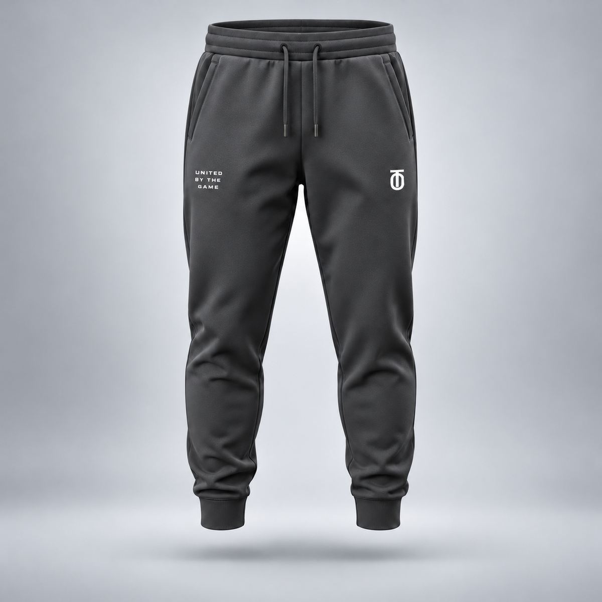 Take One Sportswear charcoal grey Football Performance Joggers front view featuring white TO monogram, United By The Game lettering, and tapered athletic silhouette.