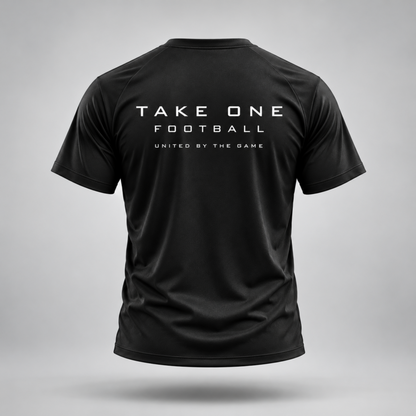 Take One Sportswear black Football Performance Tee back view featuring TAKE ONE FOOTBALL and United By The Game graphics