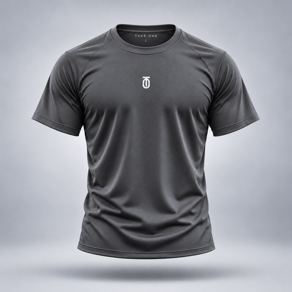 Take One Sportswear graphite gray Football Performance Tee, front view featuring a centered white TO monogram on a short-sleeve athletic shirt.