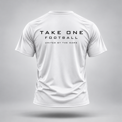 Take One Sportswear white Football Performance Tee back view featuring black TAKE ONE FOOTBALL lettering and United By The Game graphic.