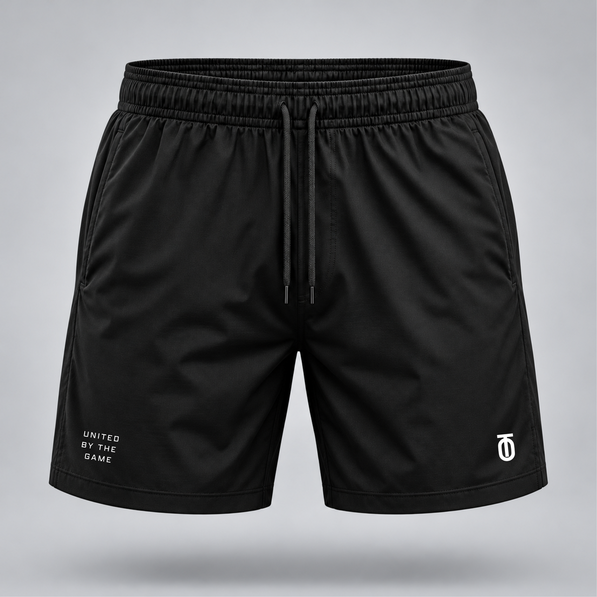 Take One Sportswear black Football Training Shorts front view featuring white TO monogram, United By The Game lettering, and 7-inch athletic fit.