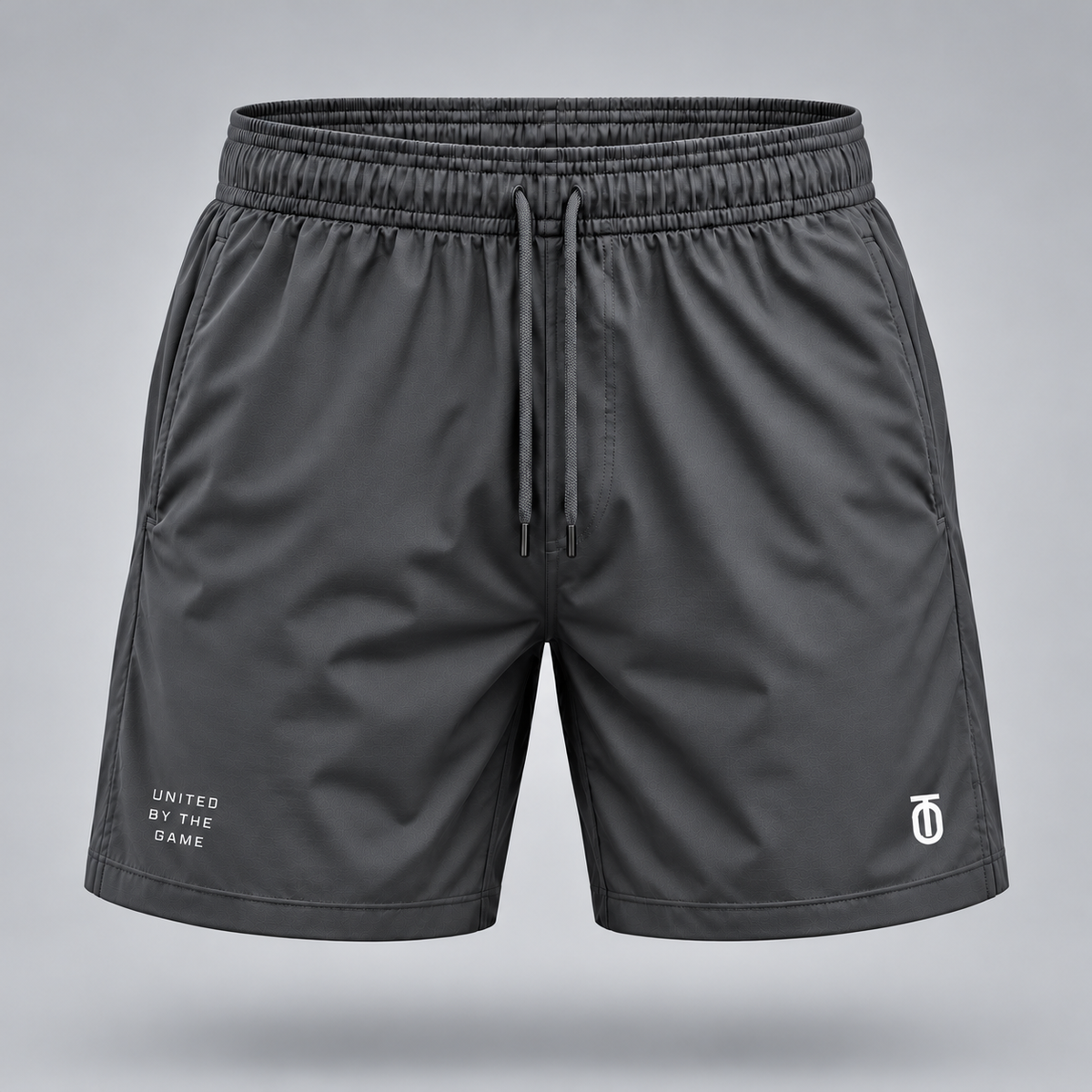 Take One Sportswear graphite gray Football Training Shorts front view featuring white TO monogram, United By The Game lettering, and athletic cut.