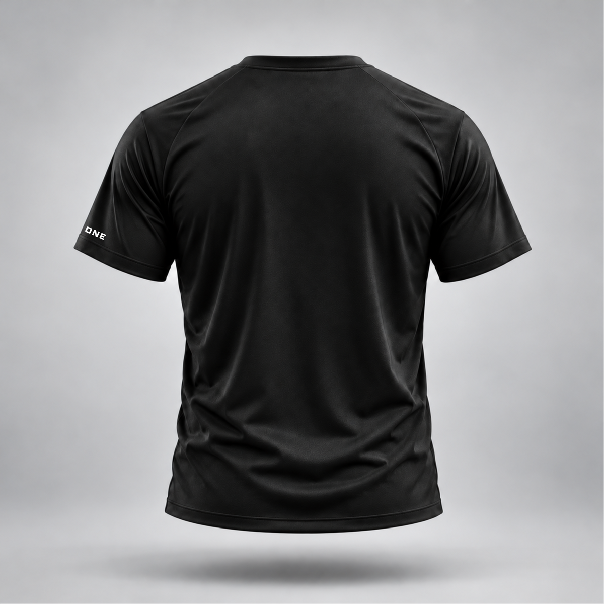Take One Sportswear Performance Tee in black, back view featuring a clean design with subtle ONE sleeve branding and athletic fit.