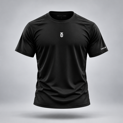 Take One Sportswear Performance Tee in black, front view featuring a white centered TO monogram, TAKE ONE sleeve branding, and athletic crewneck design.