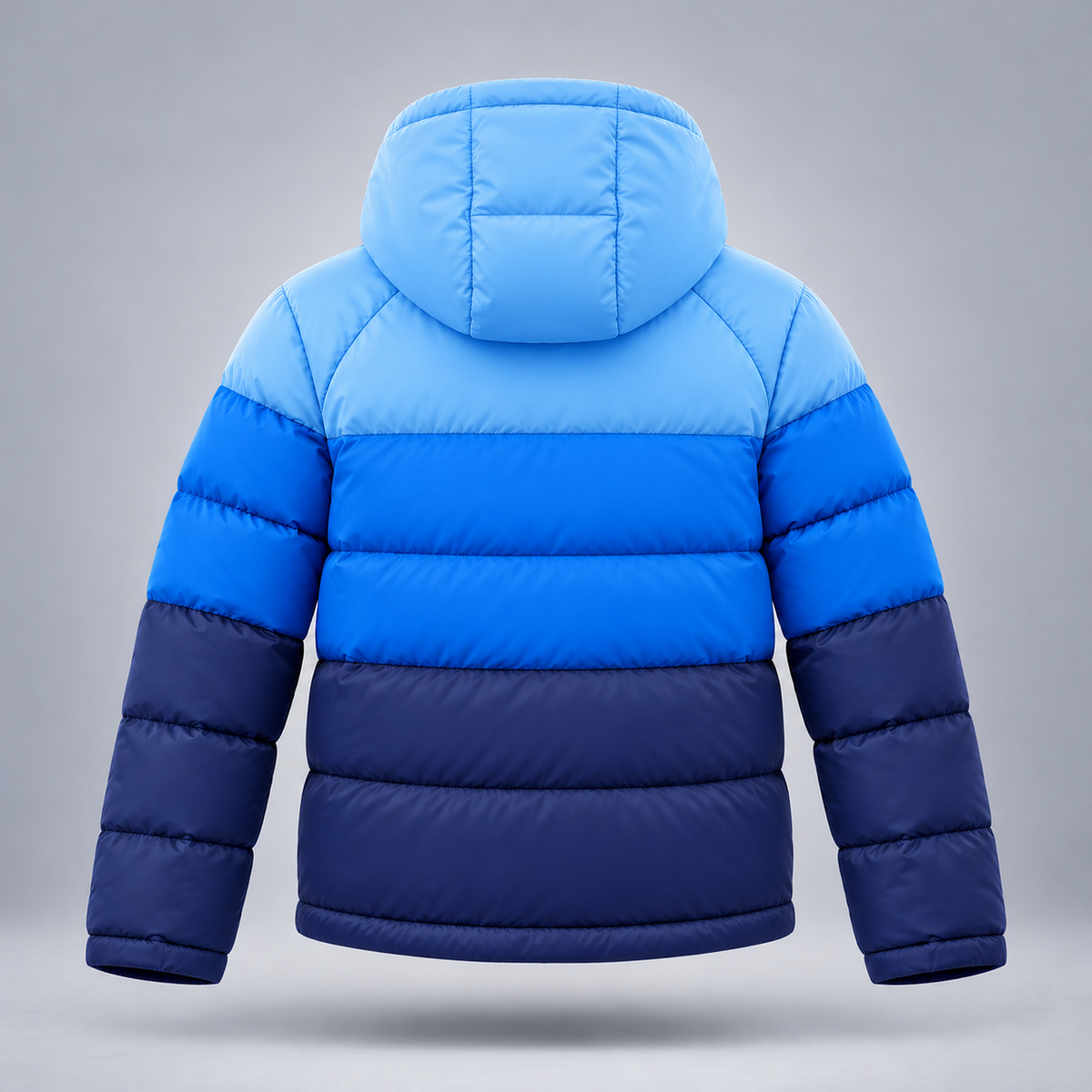 Take One Prism Kids' Color-Block Puffer Jacket by Take One Sportswear in Sky / Cobalt / Navy, back view.