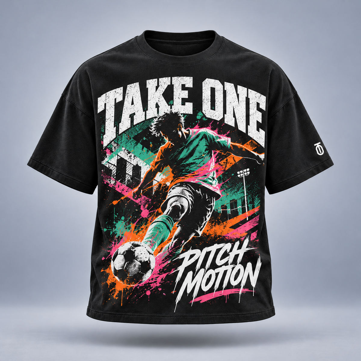 Take One Pitch Motion Graphic Tee by Take One Sportswear in Black, front view featuring original soccer action illustration and TO sleeve branding.